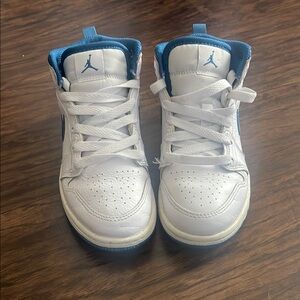 Air Jordan 1 Mid White and Blue Sneakers